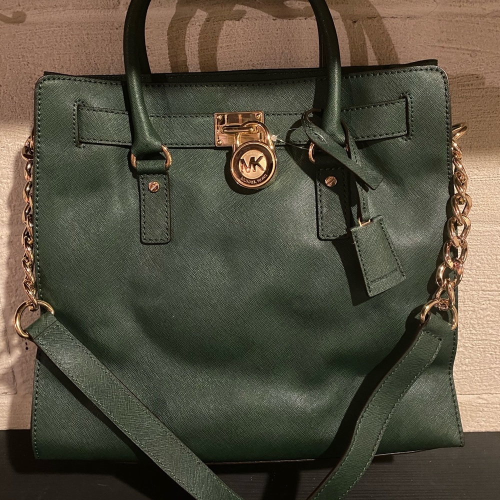 Michael Kors large hunter green purse.